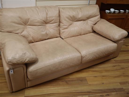 A pair of Roche Bobois peach leather two seater sofas L. 220cm approx.